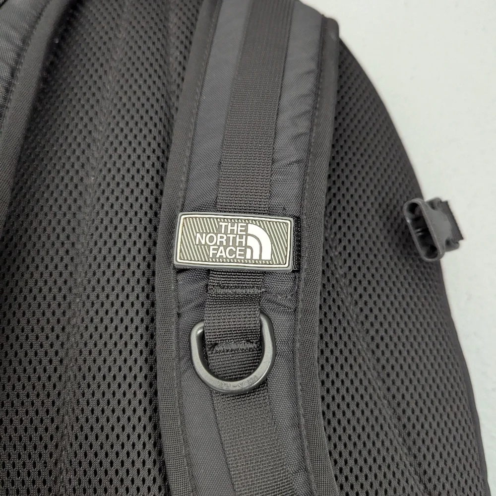 The North Face Black Amira Backpack With Adjustable Chest And Waist Straps.